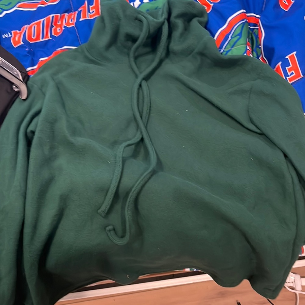 A soft fleece turtle neck with strings